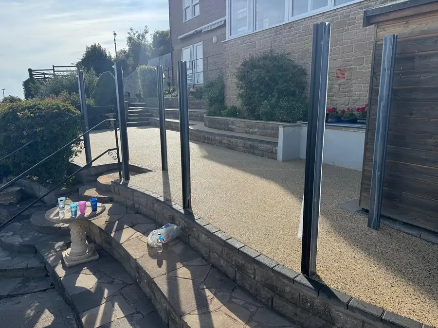 A buff resin surface at a coastal Bournemouth property, twenty-year substance behind the style