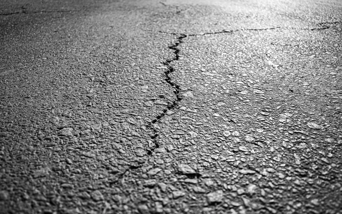 A cracked driveway surface - most resin driveway problems trace back to the base underneath, not the resin itself