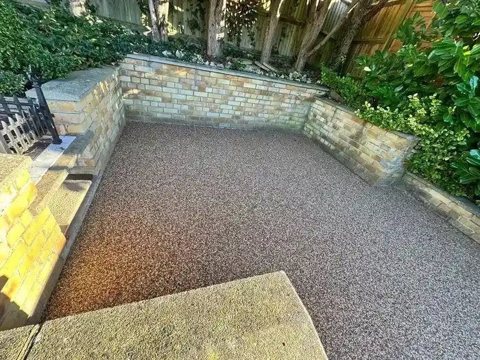 A resin driveway with a dropped kerb crossing at a Bournemouth home