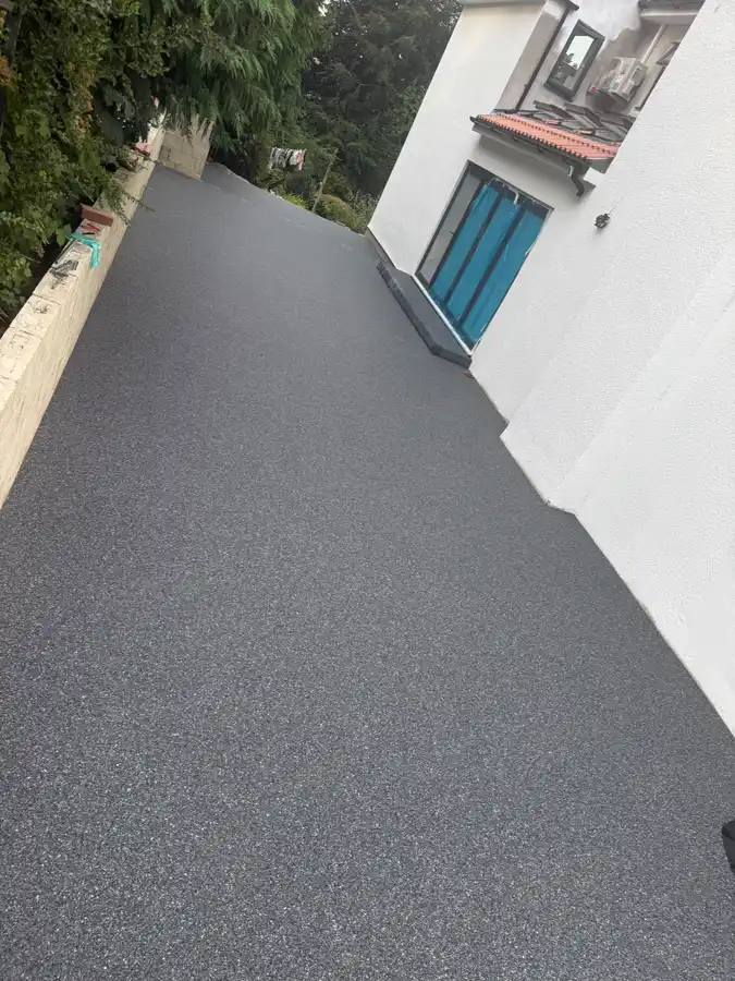 Grey resin bound driveway installed at a home in Bournemouth