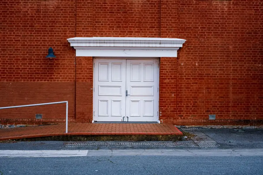 A ramp providing accessible level entrance to a home
