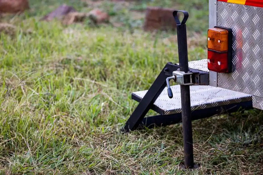 A caravan stabiliser jack and corner steady