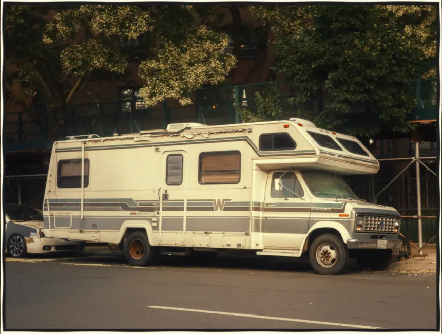 A caravan and motorhome parked at a home in the Bournemouth area