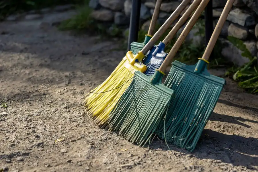 Sweeping a resin driveway with a broom