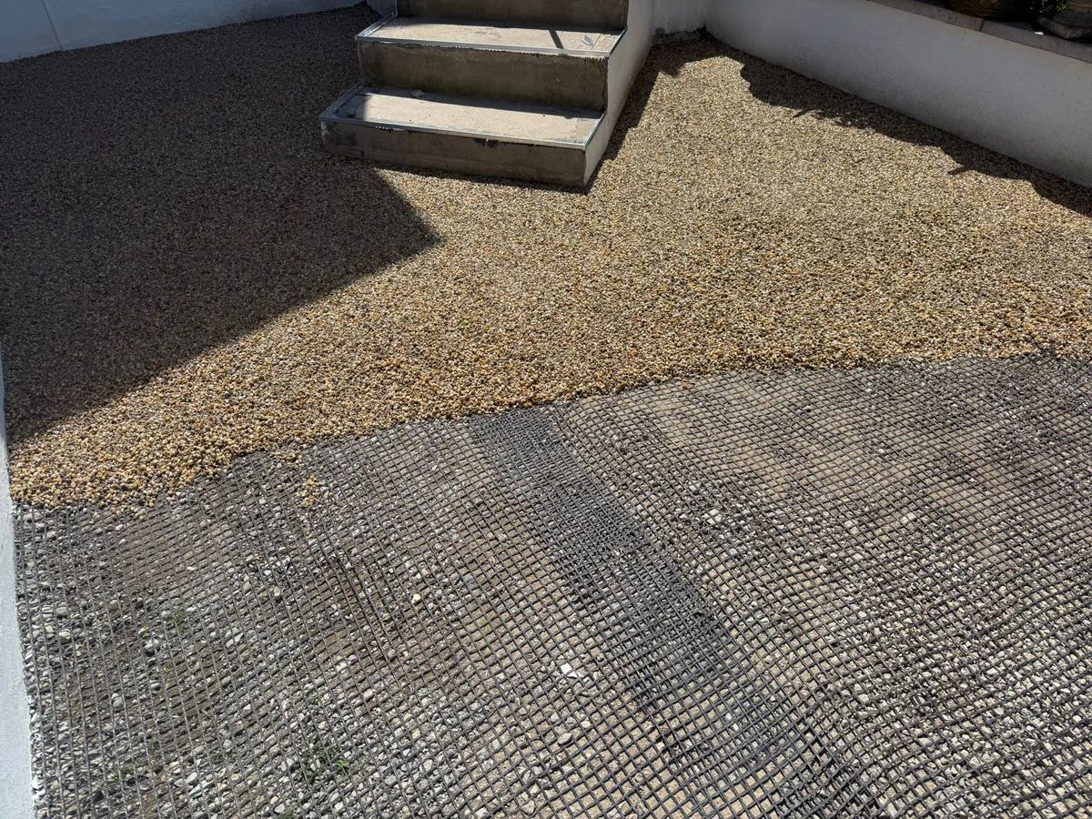 Permeable sub-base being laid during a resin driveway installation in the Bournemouth area