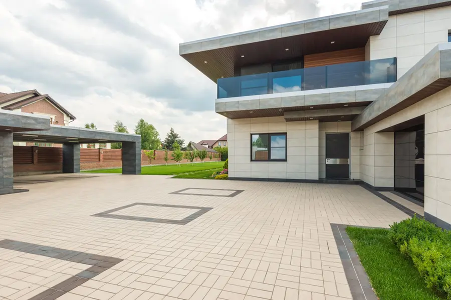 Contemporary home with a large charcoal grey driveway - a popular resin colour choice for modern Bournemouth properties