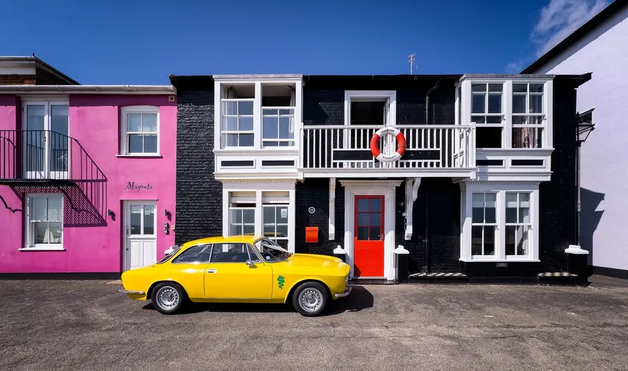 Vibrant street scene near Lymington - resin driveways suit all property types in the area