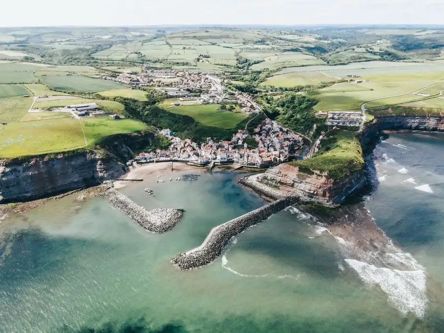 Aerial view of a coastal village near Swanage - resin surfaces handle coastal conditions well