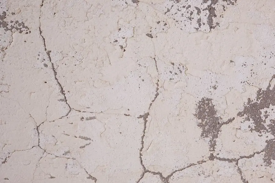 A cracked concrete surface - when resin cracks, it is almost always reflecting movement in the base it was laid over