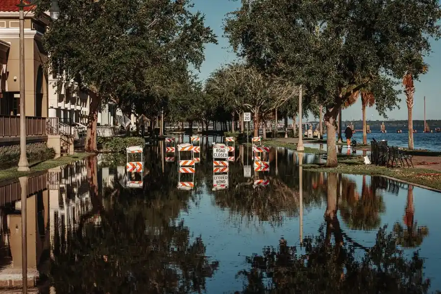 A flooded residential street after heavy rain