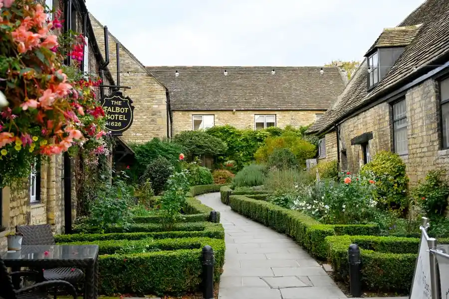 A joined-up front garden with driveway, path and patio in one material