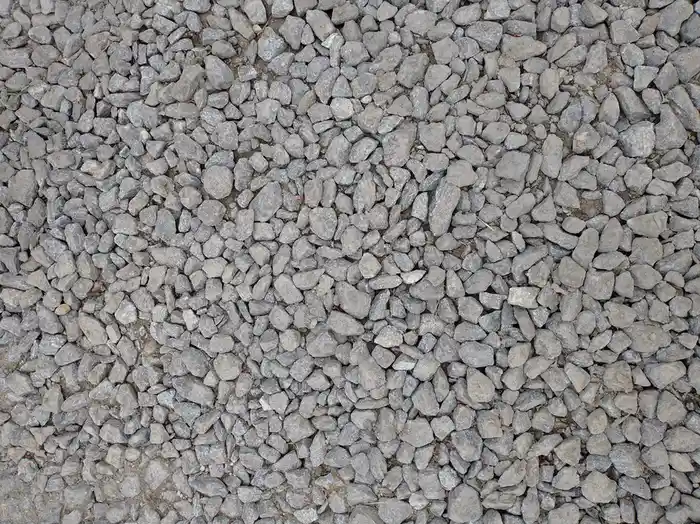 An existing concrete driveway surface being assessed for a resin overlay