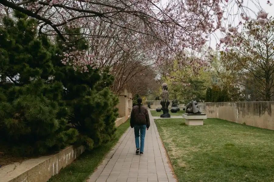 A person walking comfortably on a firm, grippy driveway surface